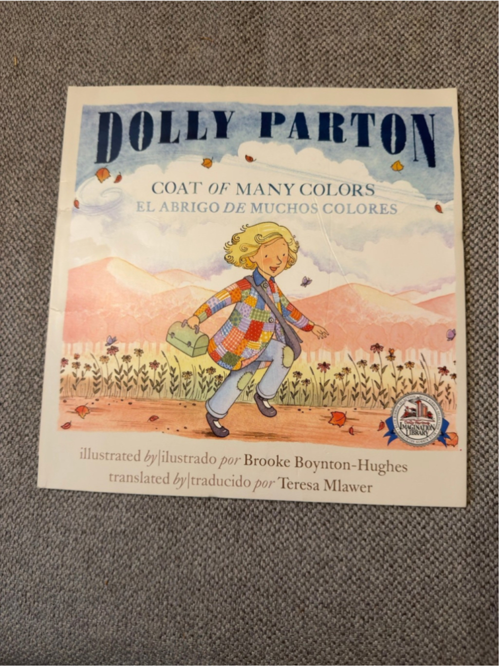 bilingual children's picture book Coat of Many Colors by Dolly Parton from 2016